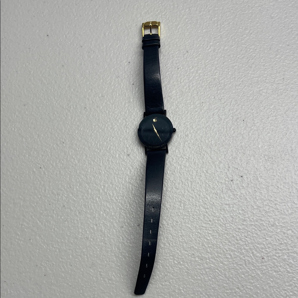 Movado Womens Watch With Black Leather Strap And Gold Buckle